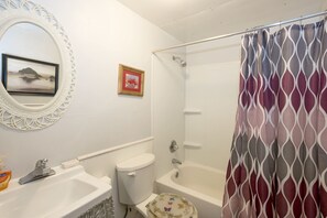 Combined shower/tub, hair dryer, towels, soap