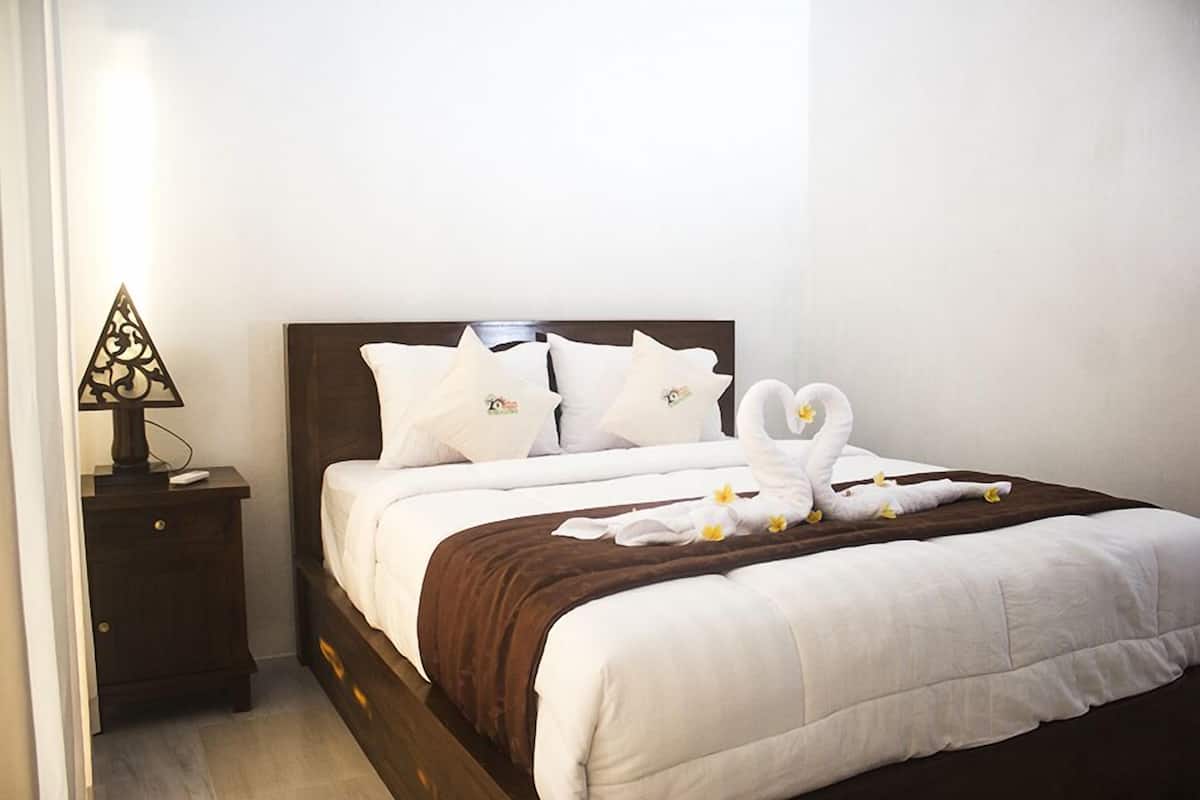 Bungalow Deluxe, 1 cama de matrimonio, vistas parciales al mar | 1 dormitorio, escritorio, wifi gratis