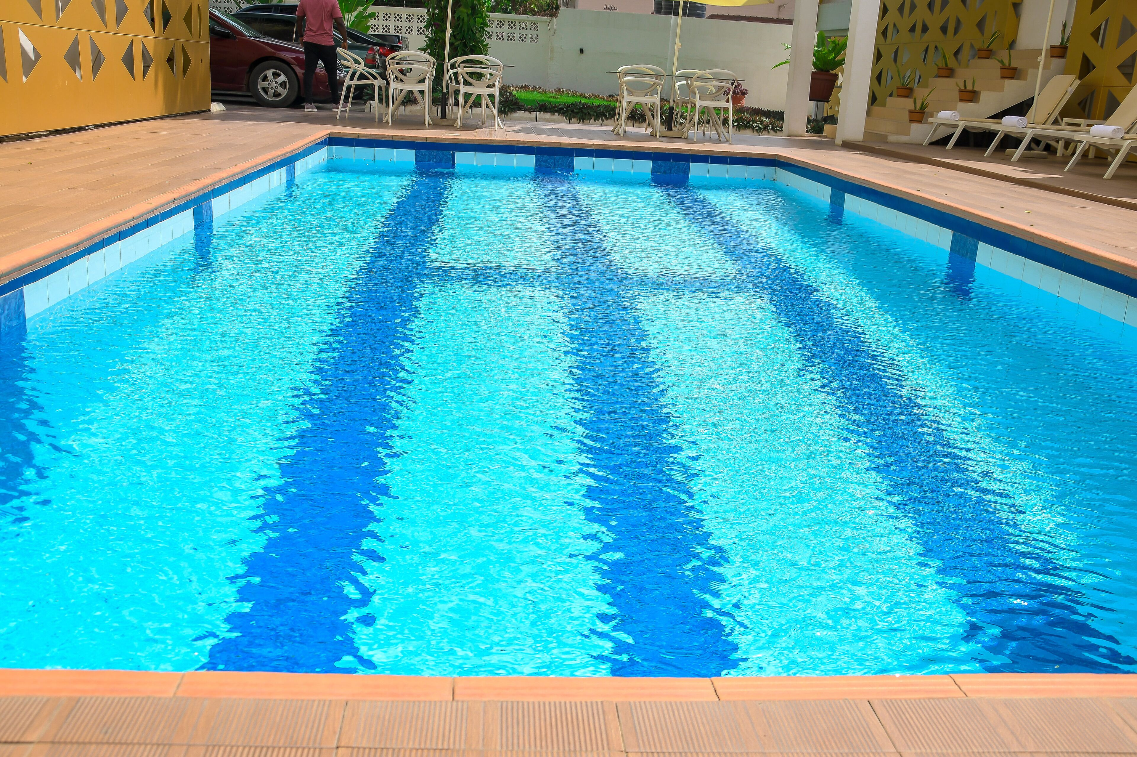 indoor pool, pool umbrellas, pool loungers