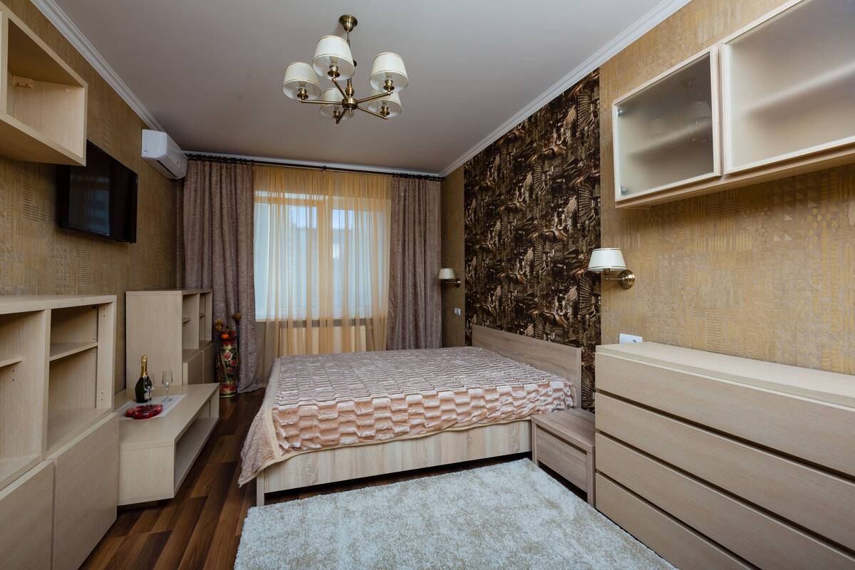 Premium bedding, down duvets, blackout curtains, iron/ironing board