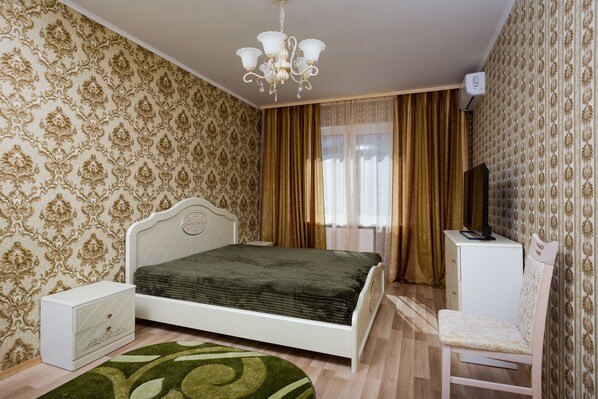 Premium bedding, down duvets, blackout curtains, iron/ironing board