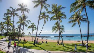 On the beach, sun-loungers, beach towels