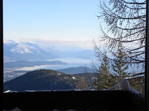 A view of snow-covered mountains and a body of water.