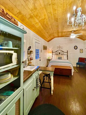 1 bedroom, desk, iron/ironing board, travel crib