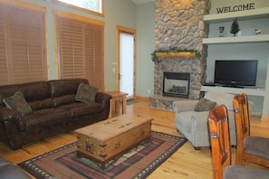 Smart TV, fireplace, DVD player, books
