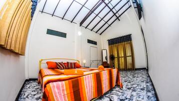 Deluxe Triple Room (AC) | Premium bedding, desk, soundproofing, free WiFi