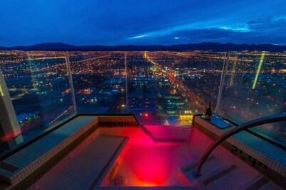 Located at Palms place hotel condo. We offer free parking and no resort fees.