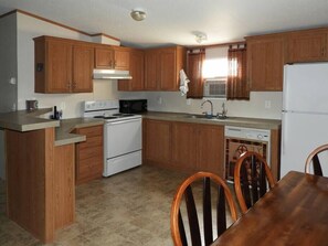 Fridge, microwave, oven, stovetop - Corazones Draw Ranch: Spacious Home on 400 acres (Brewster County)