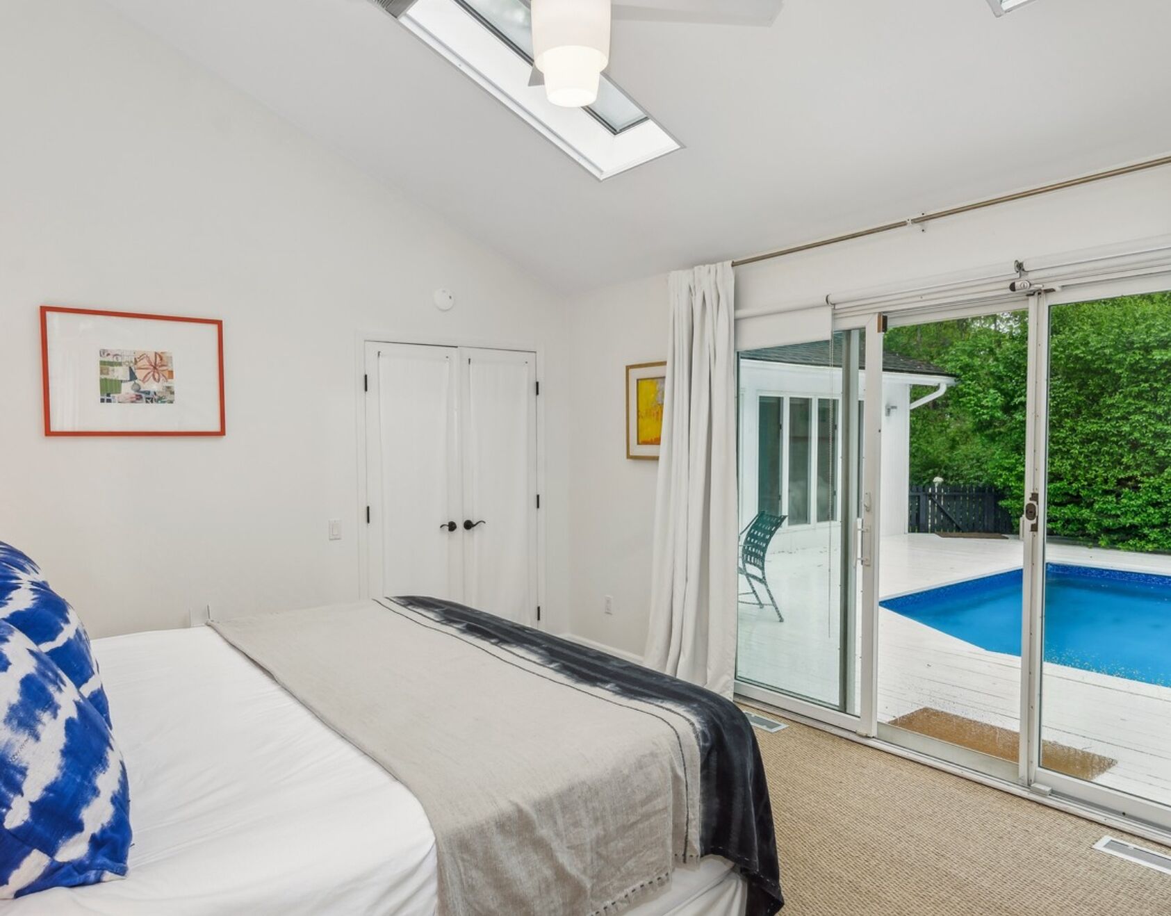 1/3 primary bedrooms with king bed