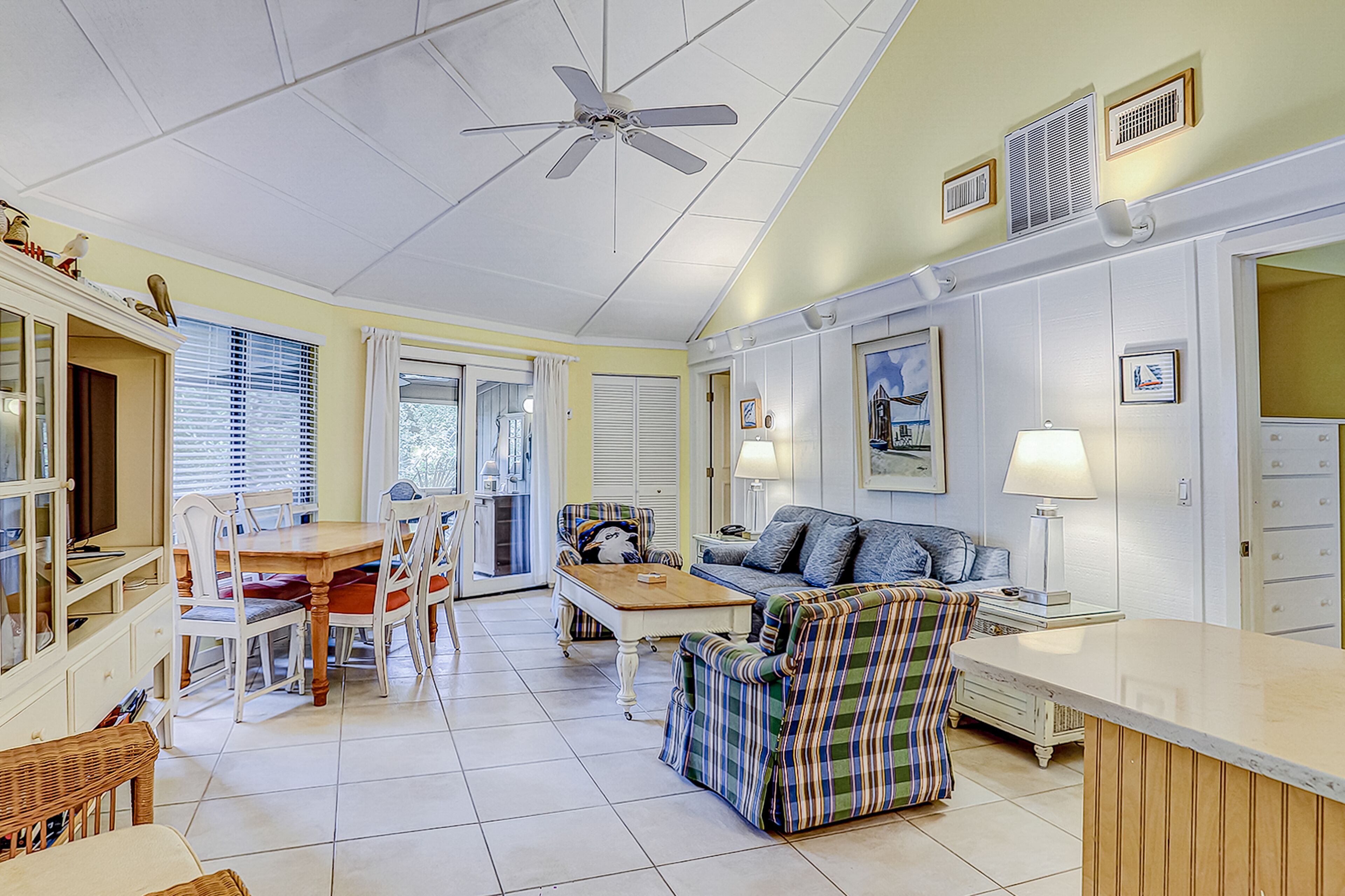 Cozy bungalow offers privacy, shared pool, and beach access via dedicated trail