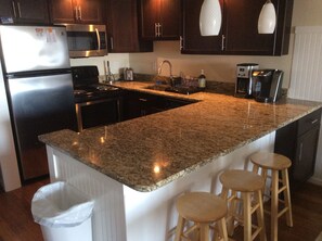 Fridge, microwave, oven, stovetop - Newly Renovated And Furnished Oceanfront Condo (Ocean City)