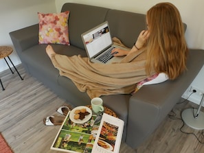 Apartment, 1 Bedroom | Living area | Smart TV