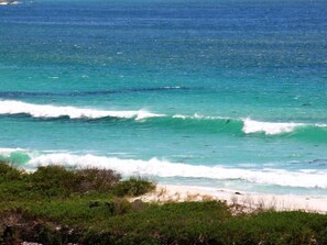 On the beach, sun loungers, beach towels