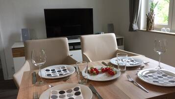 Apartment, 1 Bedroom | Living area | Smart TV