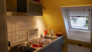 Apartment, 1 Bedroom | Private kitchen | Full-size fridge, oven, stovetop, dishwasher