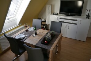 Apartment, 1 Bedroom | Living area | Smart TV