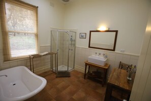 Bathtub, eco-friendly toiletries, hair dryer, towels