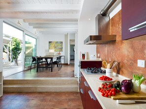 Villa, 4 Bedrooms | Private kitchen | Full-size fridge, oven, stovetop, coffee/tea maker