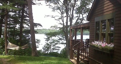 Peaceful, Rustic Retreat, 25ft of Private Beach, 300 Acre Sandy Bottom Pond