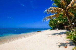 On the beach, sun-loungers, beach towels -  BEST BEACH FRONT Location on West Bay Beach-Private Yet Close to Everything (Roatan Island)