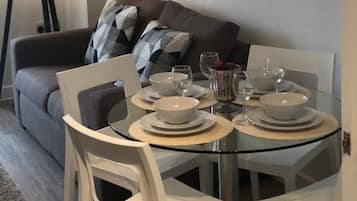 Apartment, 2 Double Beds, Non Smoking | Living area | Flat-screen TV