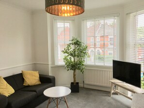 Apartment, Balcony | Living area | Flat-screen TV