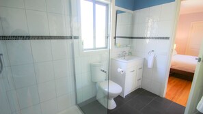 Bathtub, hair dryer, towels