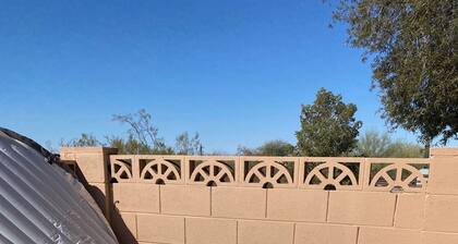Guesthouse, with quail, cactus, & desert.