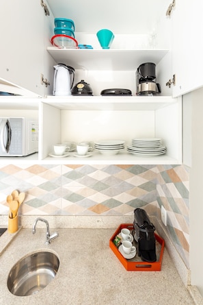 Fridge, microwave, stovetop, coffee/tea maker