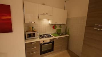 Appartamento City | Cucina privata | Microonde, piano cottura, lavastoviglie, macchina per caffè espresso