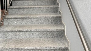 A staircase with metal railings, leading to an upper floor. - Hotel Am Spielacker (Gelnhausen)