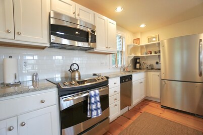 Gorgeous home in town 3Bed 3 bath. screened porch- 3 levels of living & parking