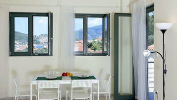 Apartment, 2 Bedrooms, Sea View | Living area | Flat-screen TV