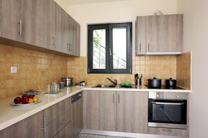Apartment, 2 Bedrooms, Sea View | Private kitchen | Full-size fridge, oven, stovetop, cookware/dishes/utensils - Ithaca's Poem (Ithaki)