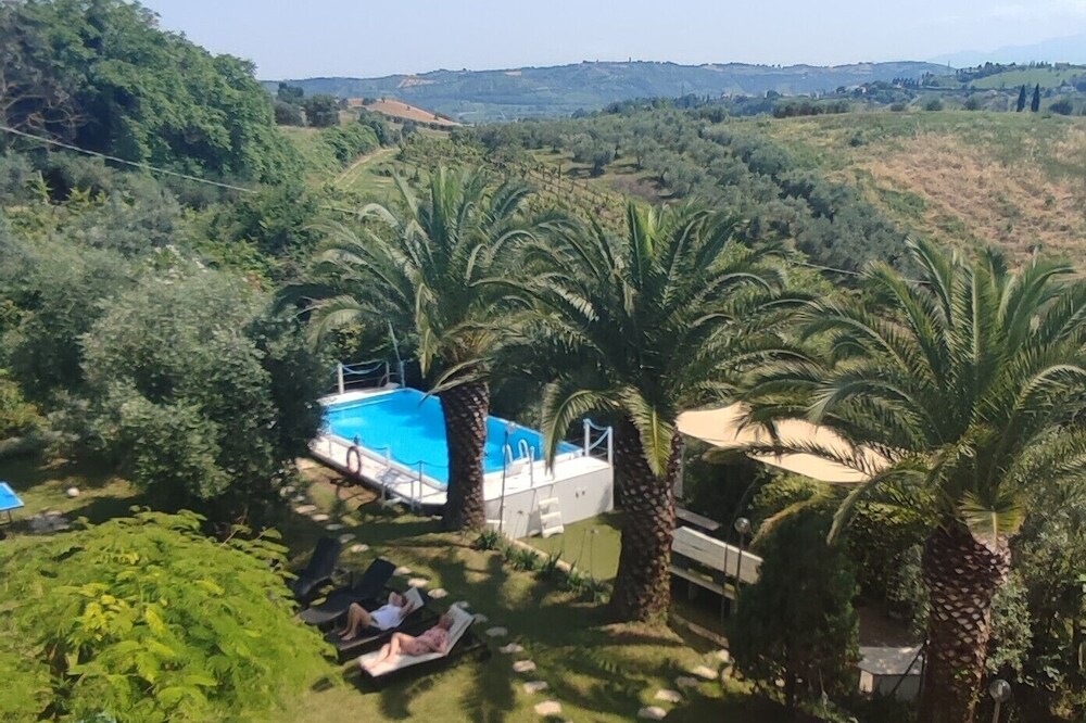 Country house in the green of Mediterranean vegetation
