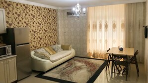 Apartment | Living room | 60-cm LCD TV with digital channels, TV, Netflix - Orbe Sea Tower ONE (Batumi)
