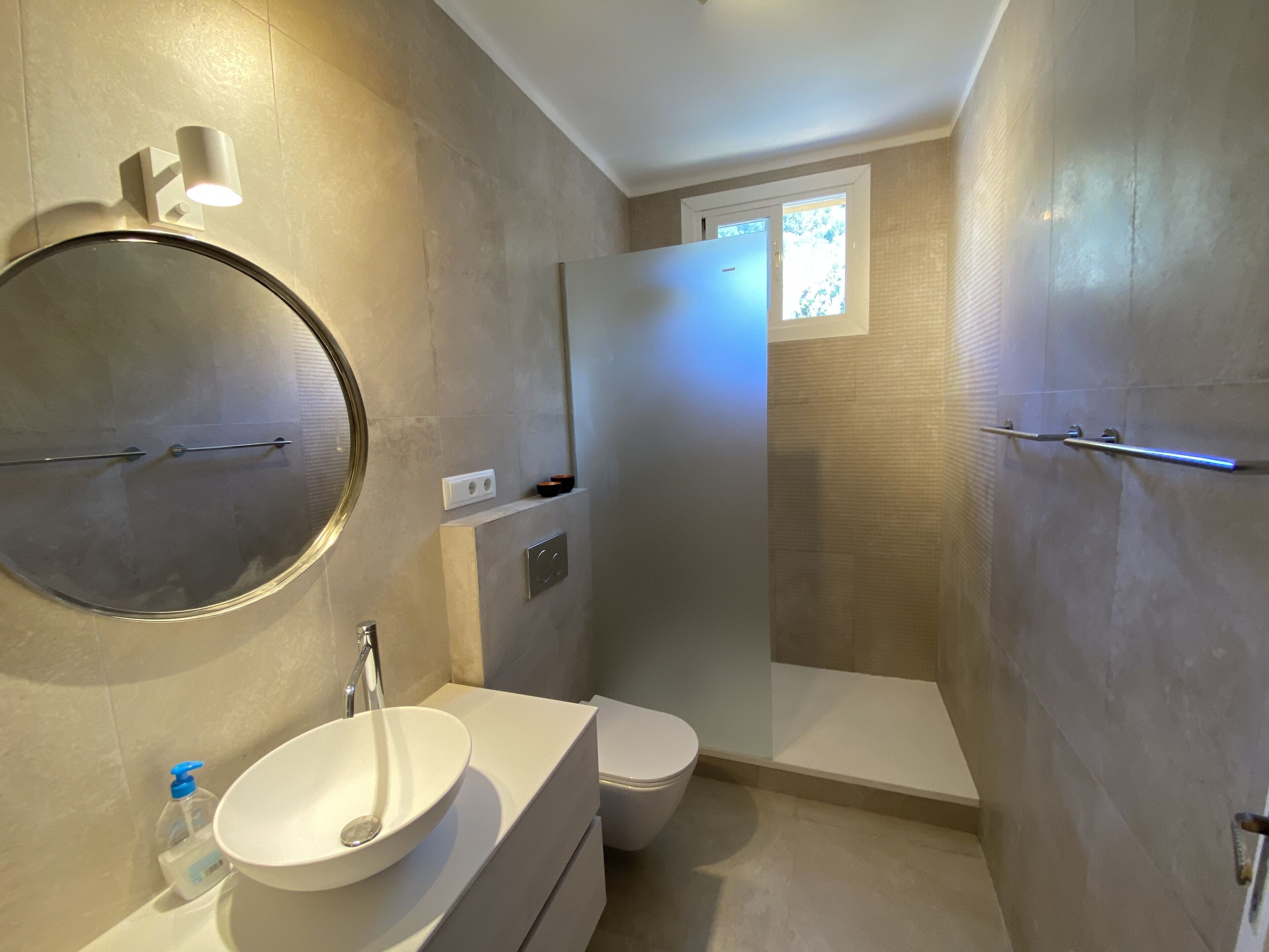 Shower, hair dryer, towels, toilet paper