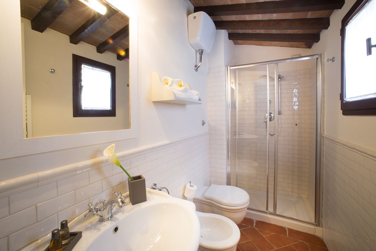 Shower, eco-friendly toiletries, hair dryer, bidet