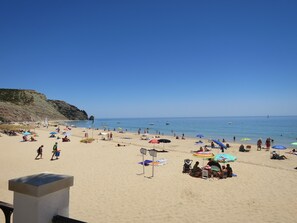 On the beach, beach towels