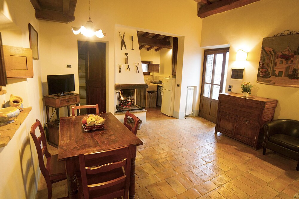 Apartment with garden in old farmhouse with swimming pool