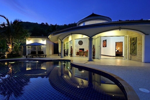 Front view of your villa at sunset