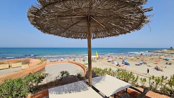 Beach nearby, sun loungers