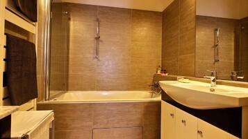 Shower, eco-friendly toiletries, hair dryer, towels
