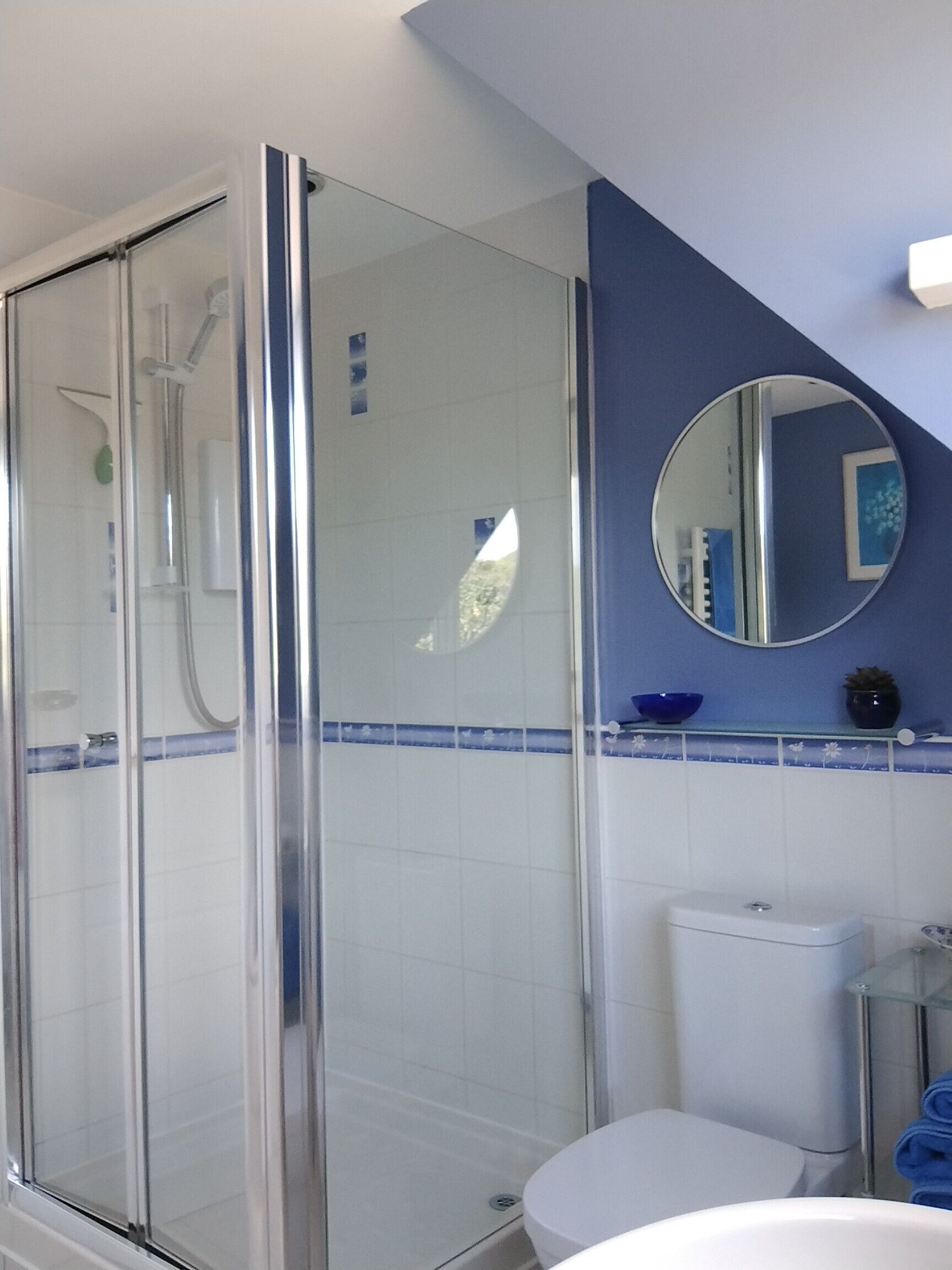 Bathtub, hair dryer, towels, soap