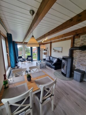 Smart TV, fireplace, table tennis, books