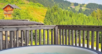 CHALET CHESETTA Mountain cabin—dogs welcome—at 1,600 m, with a sauna, hot tub, balcony...