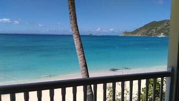 On the beach, sun loungers, beach towels