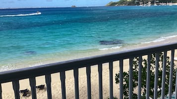 On the beach, sun-loungers, beach towels