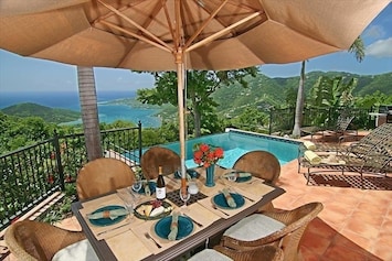 Outdoor dining..... with an insane view over Coral Bay, East End, British VI's