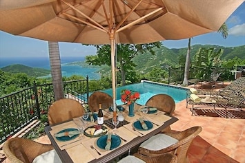 Outdoor dining..... with a view over Coral Bay and the British VI's